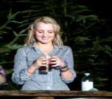 Evanna Lynch consuming alcohol